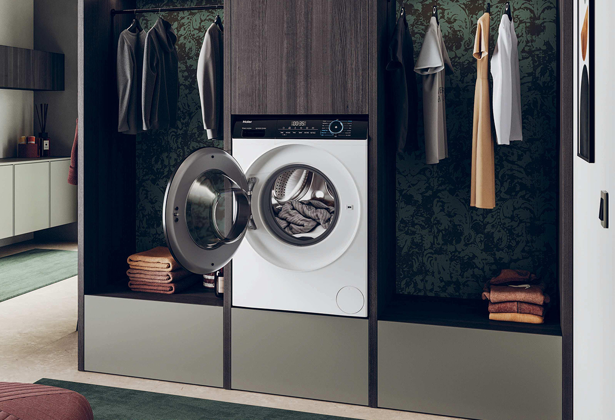 Απεικονίζεται η συσκευή με ανοιχτό κάδο εγκατεστημένη σε ντουλάπα.